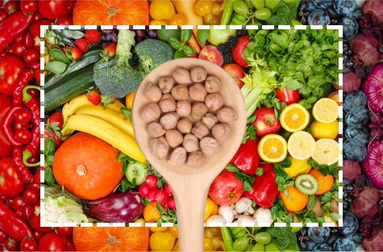 fruits, veggies, and spoon with chickpeas