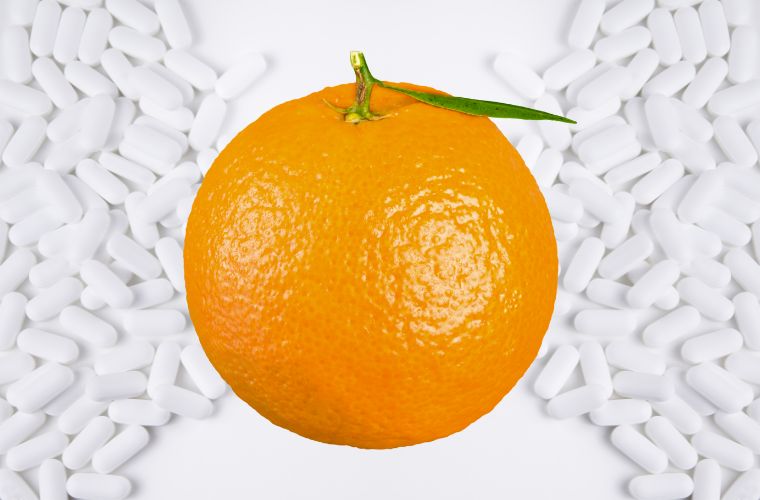 image of orange and pills