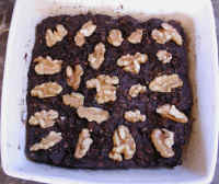 banana carob coconut raisin oatmeal cookie bars with walnuts