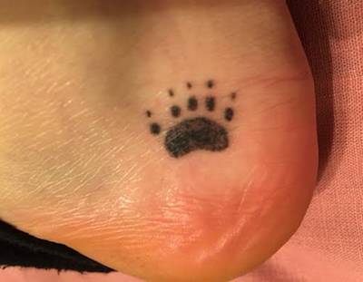 skunk paw tattoo