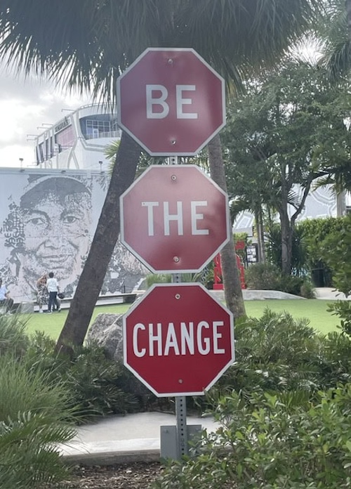 stops signs that say be the change