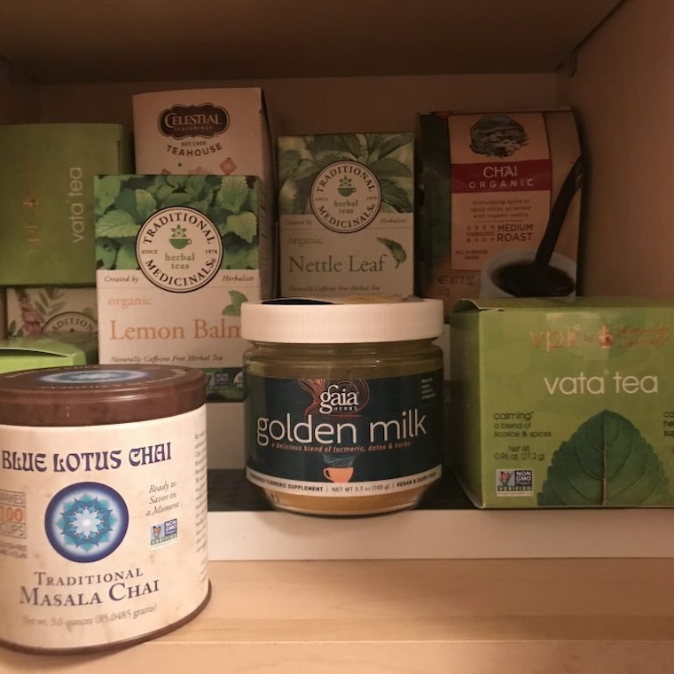 containers of various teas