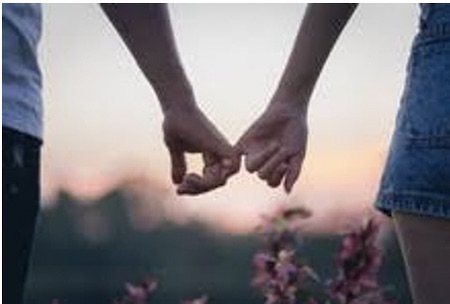 couple holding hands