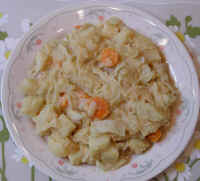 Cabbage, Carrots, and Onions with Uncheese Sauce