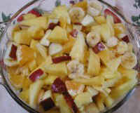 Fruit Salad with Apples, Bananas, Oranges, and Pineapple
