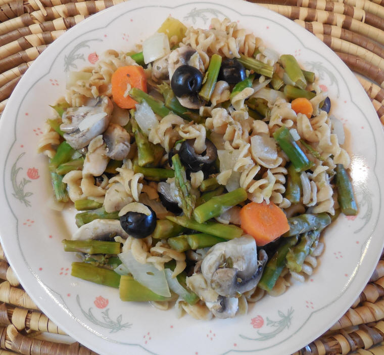 Pasta Primavera with Asparagus, Mushrooms Carrots, Olives and Lemon Sauce