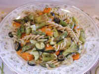 Pasta Primavera with Fusilli, Asparagus, Broccoli, Carrots, Olives, Onions, Zucchini, and Lemon Sauce