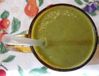 Smoothie with Banana, Cantaloupe, Collard Greens, and Peach